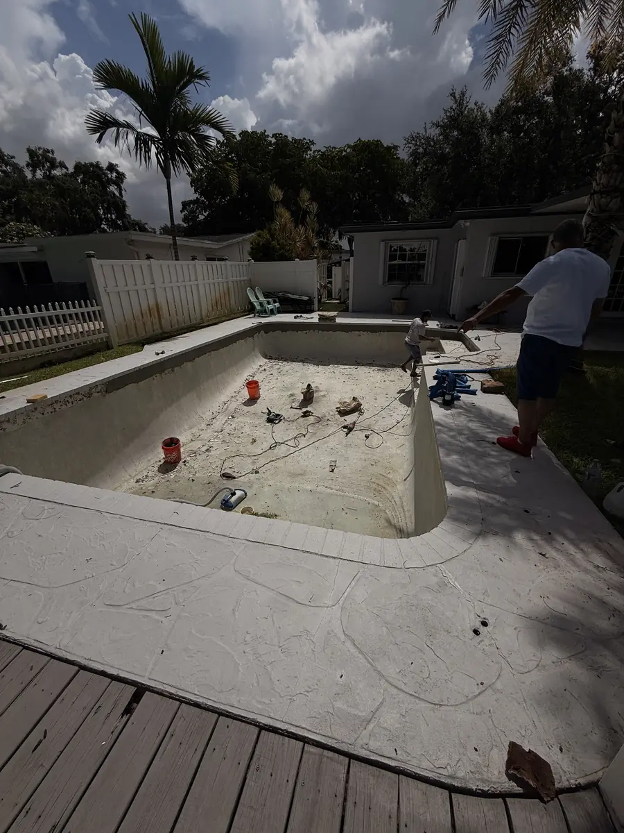 Pool resurfacing: empty shell to finished pool - before