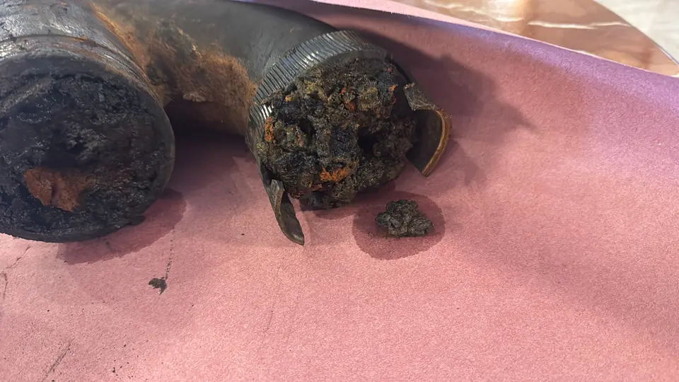 Buildup inside old cast-iron pipes - real Remodel Right FL project